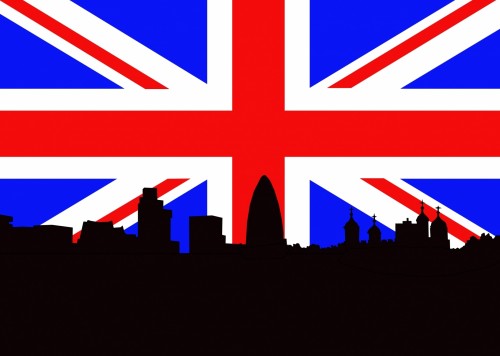tower of london and london skyline against union jack